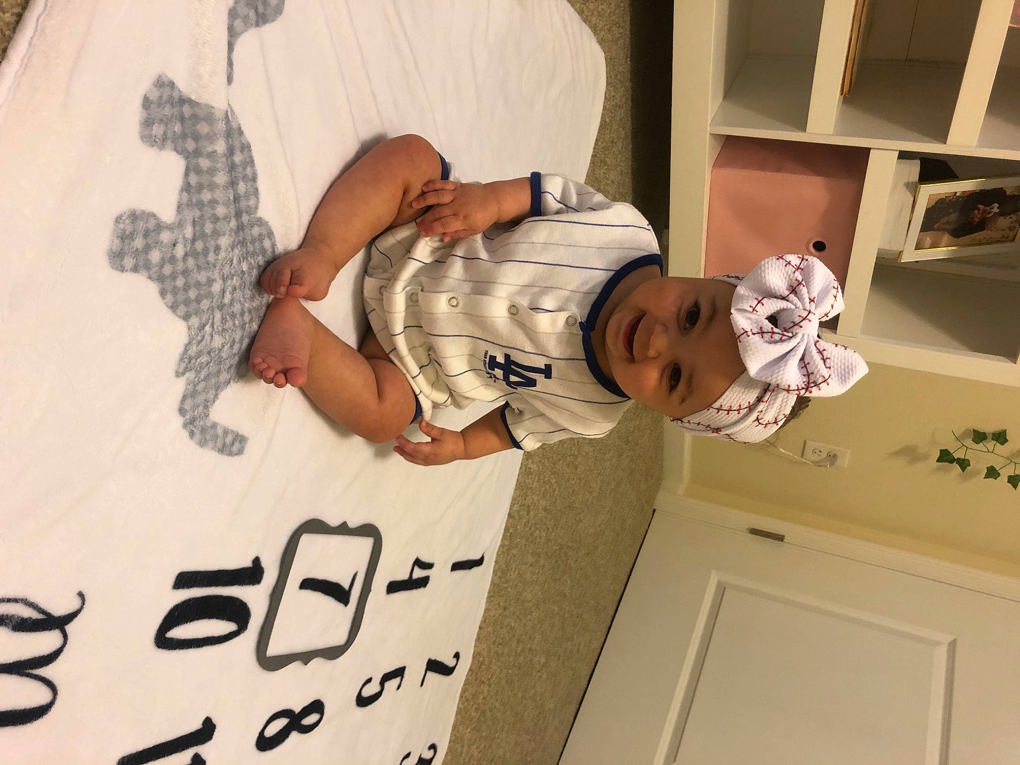 Kataleya joined the competition — help win amazing prizes! baby, baby_safety, baby_toddler_clothing, child, comfort, door, finger, font, handwriting, happy, hat, headwear, joy, pattern, people, person, room, shelf, shelving, sleeve