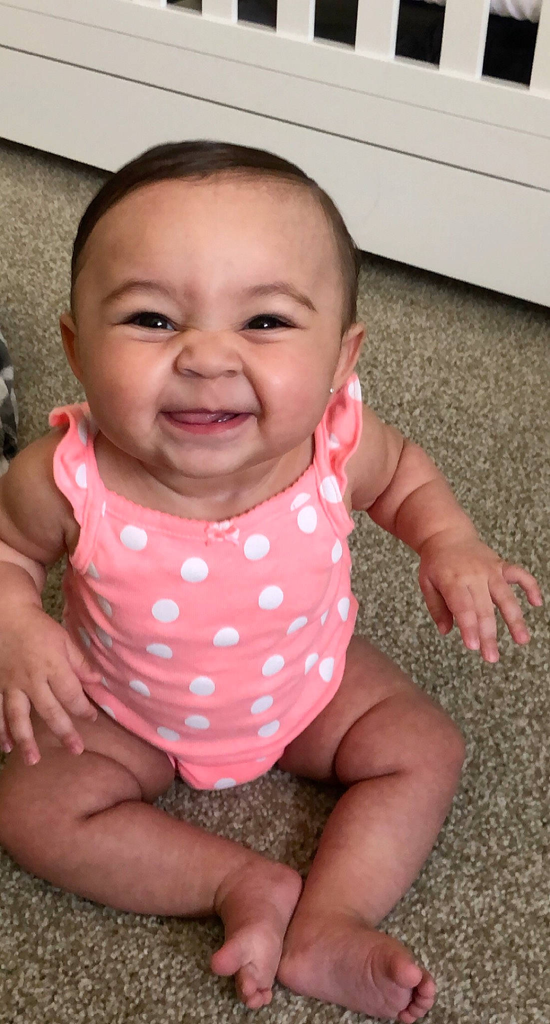 Kataleya is registered to the contest to win money with this photo: arm, baby, baby_toddler_clothing, cheek, chin, dress, eye, face, hair, hand, happy, head, iris, joy, lip, mouth, neck, nose, person, skin