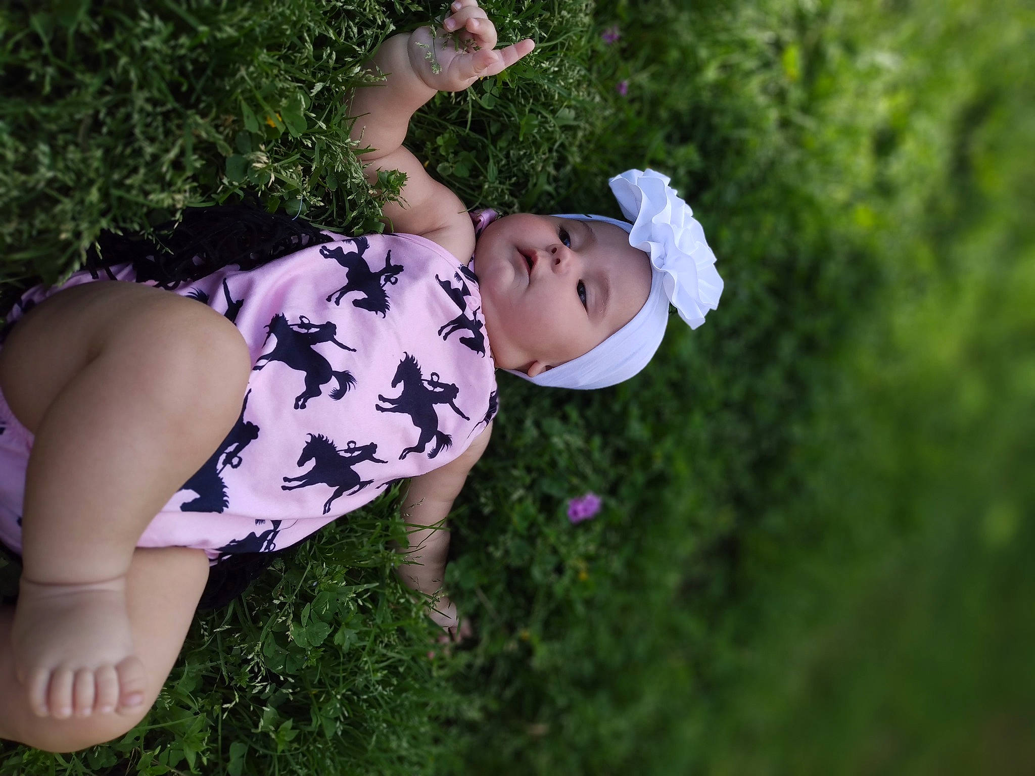 Ella'Rae is registered to the contest to win money with this photo: black_hair, brown_hair, child, doll, fawn, flash_photography, fun, garden, grass, grassland, happy, human_body, human_leg, meadow, pattern, people_in_nature, person, plant, thigh, tree
