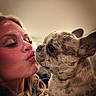 Frank joined the competition — help win amazing prizes! affection, brindle_coat, close_up, companion, cuddle, dog, ears, eyes, face, french_bulldog, funny_expression, indoor, kiss, long_hair, nose_ring, pet, portrait, selfie, warm_lighting, woman