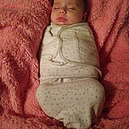 Alice joined the competition — help win amazing prizes! baby, sleeping, swaddled, blanket, pink, soft, cozy, infant, face, peaceful, resting, cute, child, bed, comfort, portrait, indoors, warm, wrapped, newborn