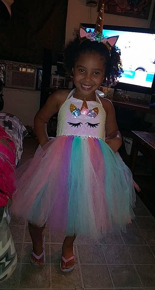 Brinleigh is registered to the contest to win money with this photo: baby_toddler_clothing, ballet_tutu, dress, event, fashion_design, fun, hairstyle, happy, joy, magenta, person, photograph, pink, ruffle, smile, snapshot, standing, television, textile, toddler