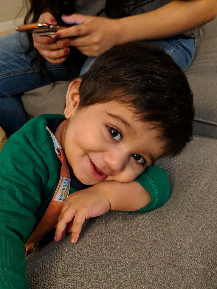 Hadi joined the competition — help win amazing prizes! arm, black_hair, cheek, child, ear, eye, face, finger, forehead, fun, gesture, hand, head, joy, mouth, person, smile, thumb, toddler