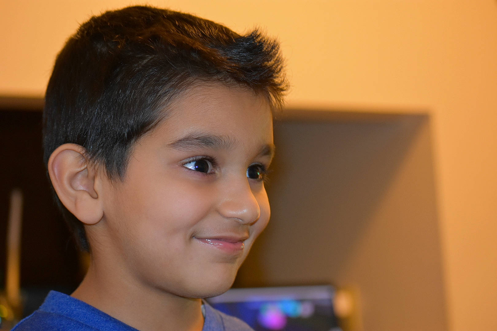 Ahmad is registered to the contest to win money with this photo: black_hair, cheek, child, chin, ear, eye, eyebrow, face, forehead, hair, hairstyle, head, joy, lip, nose, person, smile