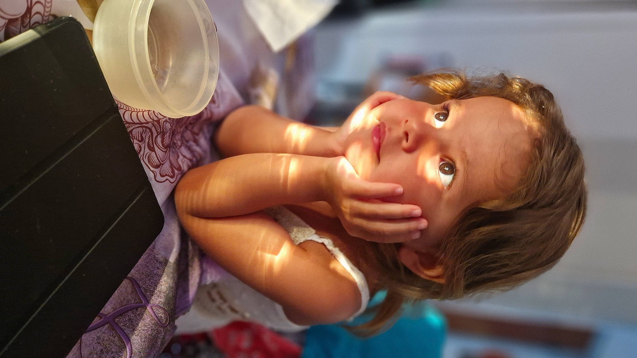 Tiana participe au concours pour gagner de l'argent avec cette photo : abdomen, bathing, chest, child, dress, elbow, eyelash, eyewear, flash_photography, fun, gesture, happy, human_leg, leisure, person, tableware, thigh, toddler, trunk, water