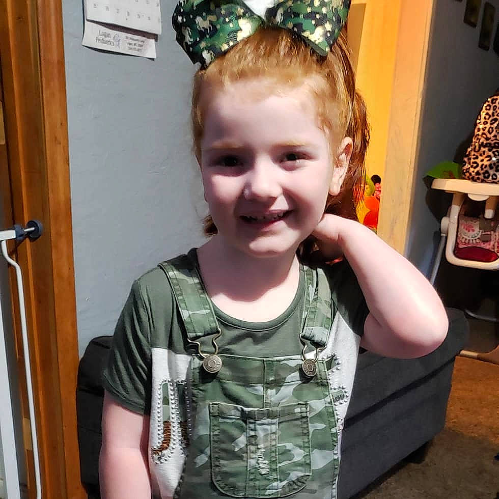 Abigael is registered to the contest to win money with this photo: child, cool, crown, ear, face, fashion_accessory, hair, hair_accessory, hairstyle, head, headband, headgear, headpiece, joy, person, t_shirt, toddler