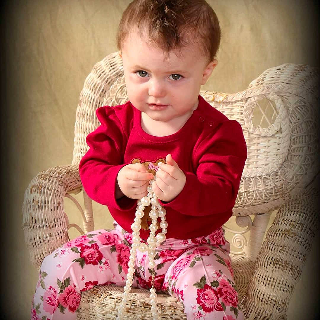 Madilyn Everleigh-june Mounts is registered to the contest to win money with this photo: baby, cheek, child, child_model, eye, finger, hand, happy, lip, outerwear, person, photography, pink, portrait, portrait_photography, sitting, skin, textile, toddler, wool