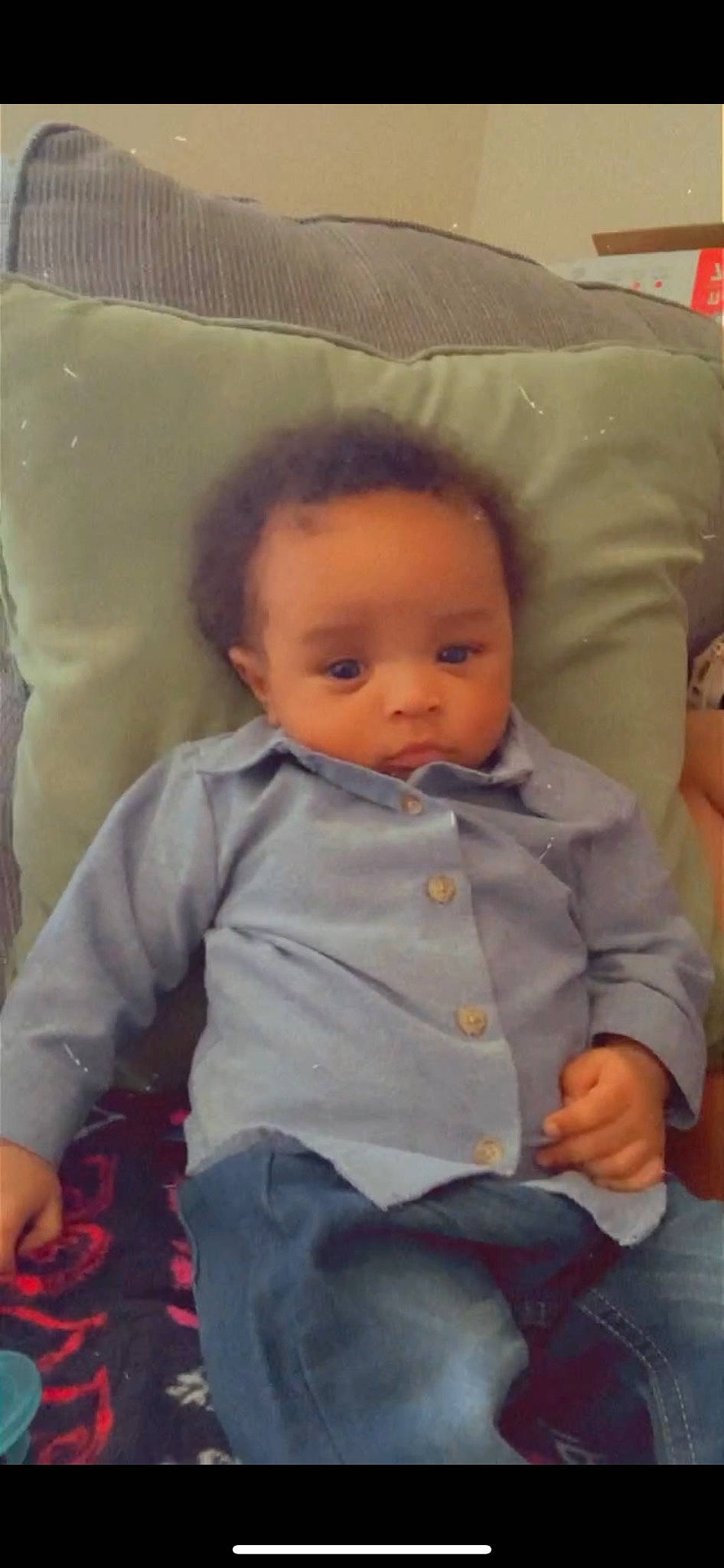 Jesiah is registered to the contest to win money with this photo: baby, baby_toddler_clothing, cheek, child, chin, comfort, eye, eyebrow, facial_expression, forehead, hairstyle, iris, lap, lip, mammal, mouth, nose, person, skin, sleeve