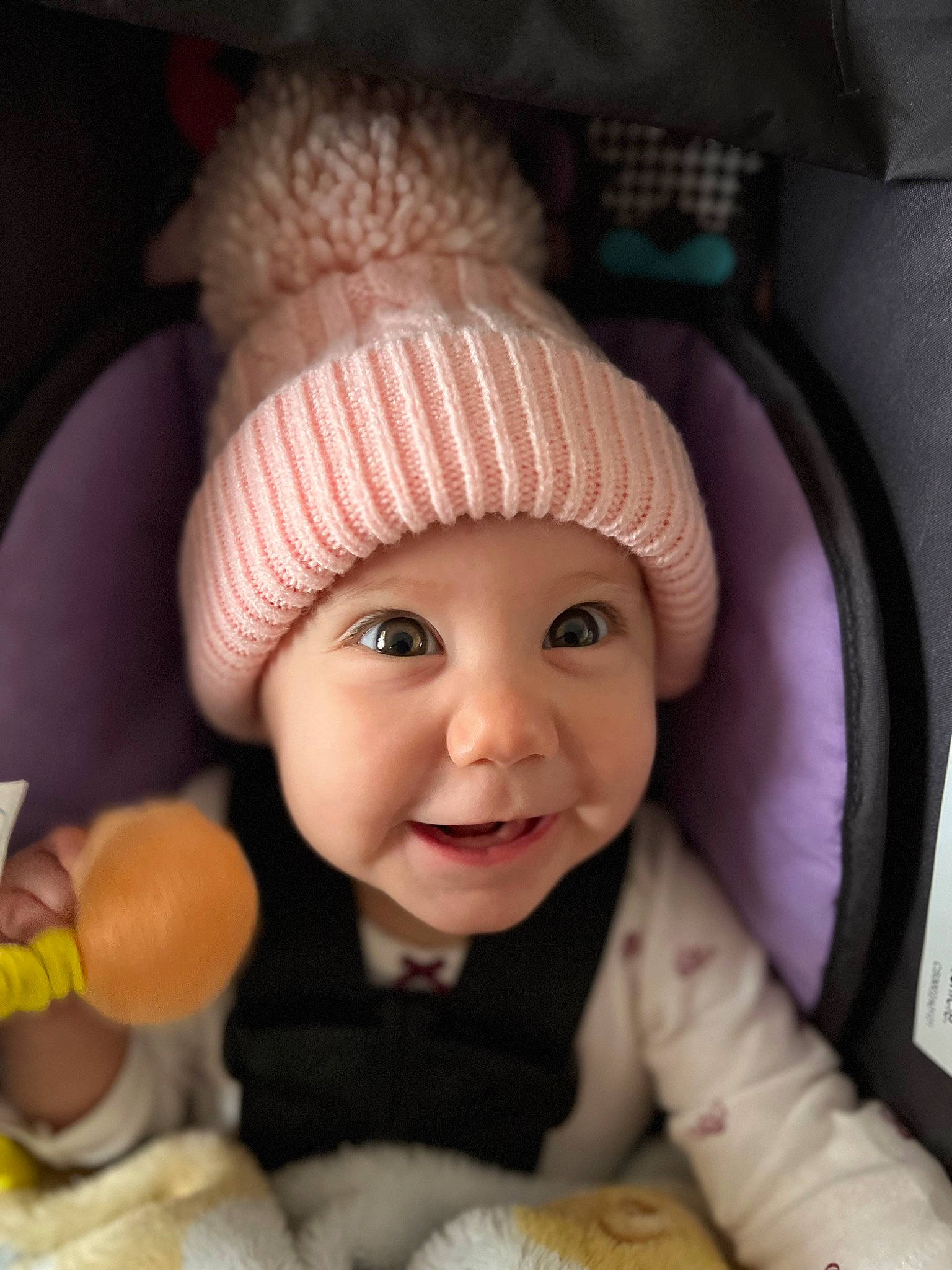 Dahlia joined the competition — help win amazing prizes! baby, baby_toddler_clothing, cap, cheek, child, comfort, eye, fashion_accessory, happy, headgear, headwear, helmet, knit_cap, nose, outerwear, person, skin, smile, textile, toddler