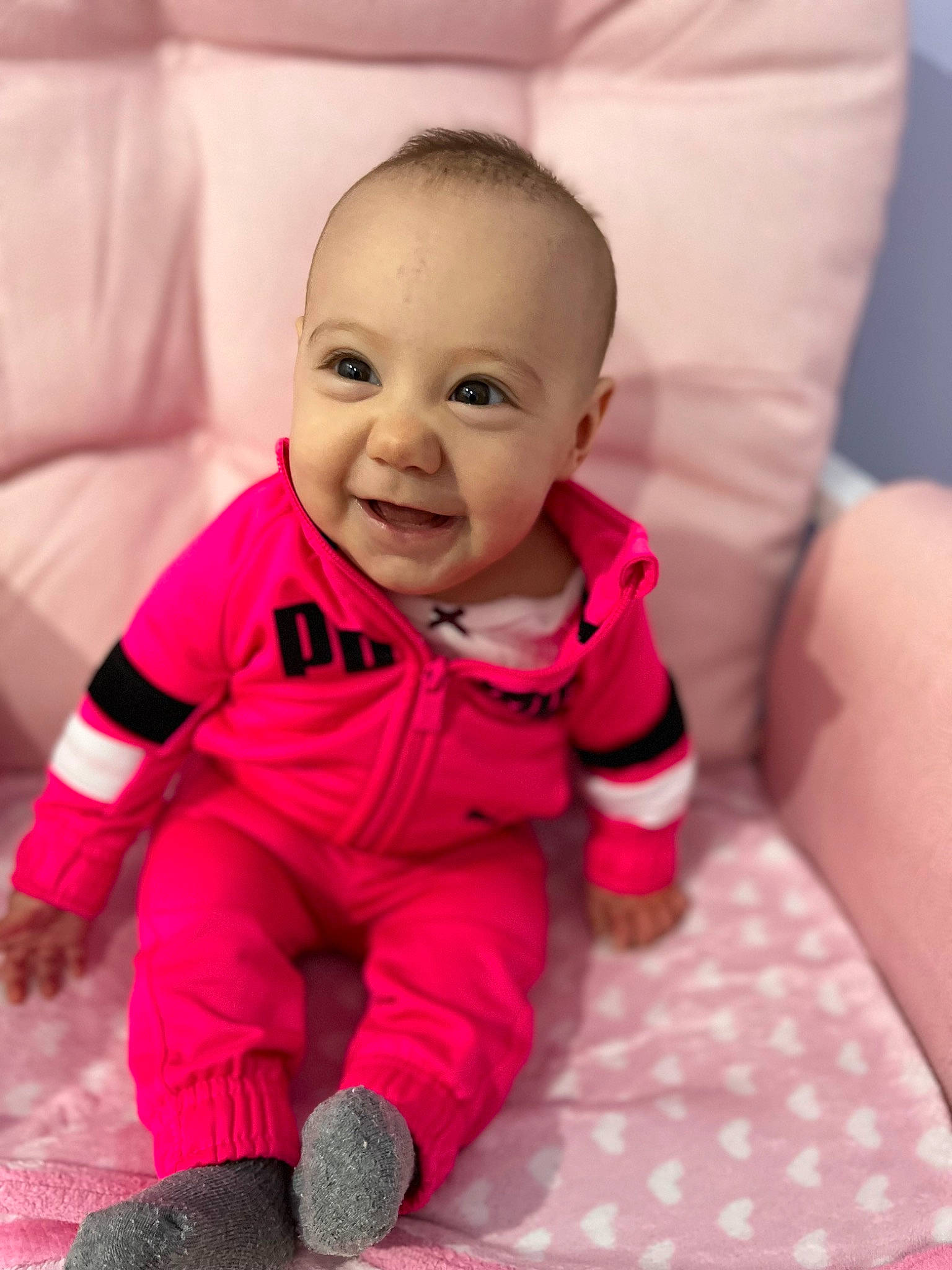 Dahlia joined the competition — help win amazing prizes! baby, baby_toddler_clothing, cheek, comfort, eye, floor, flooring, hairstyle, happy, head, joy, lip, mouth, nose, person, pink, purple, skin, sleeve, smile