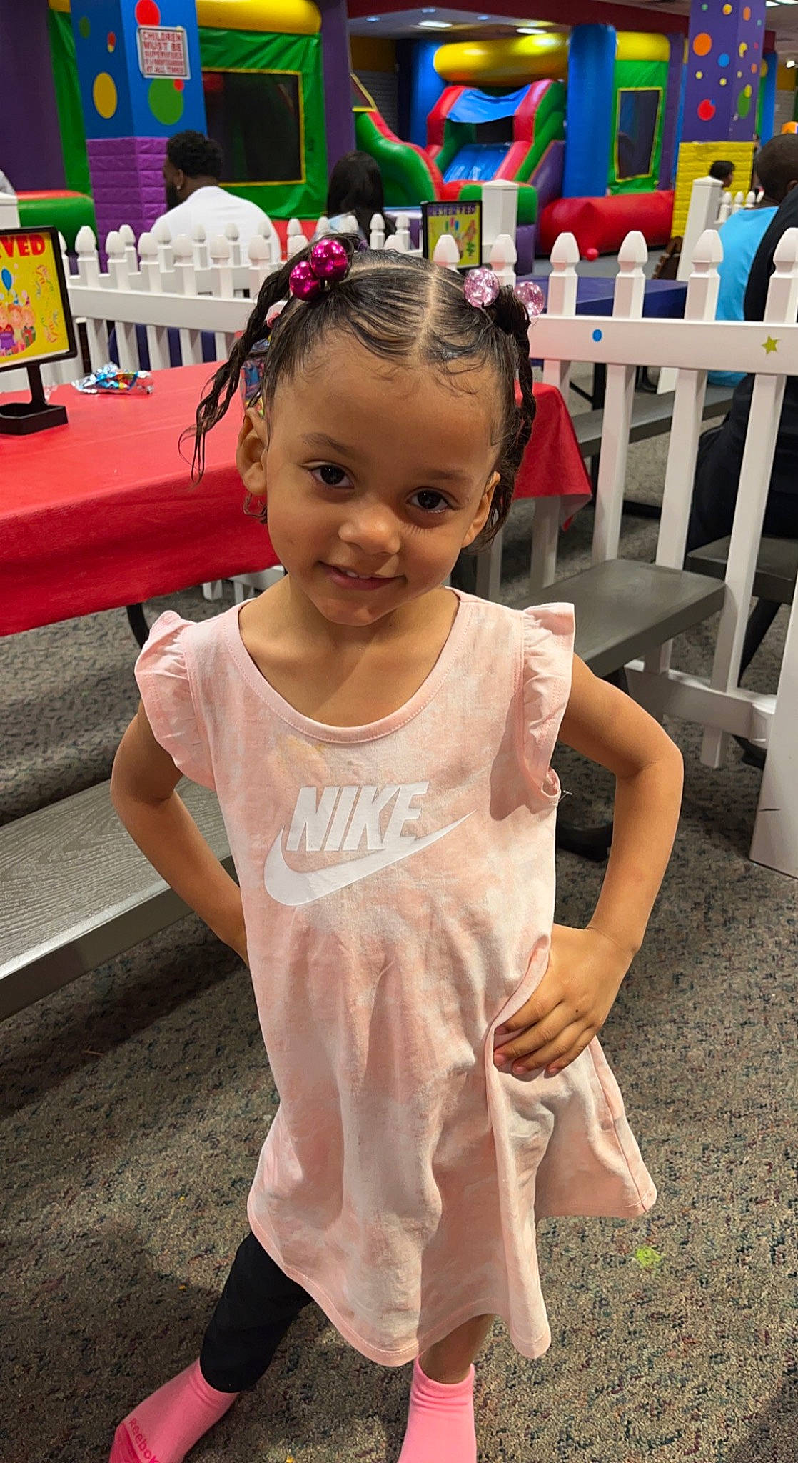 Malayah is registered to the contest to win money with this photo: baby_toddler_clothing, chair, child, dress, event, fashion_accessory, fun, happy, joy, leisure, magenta, person, photograph, pink, recreation, sleeve, smile, summer, t_shirt, textile