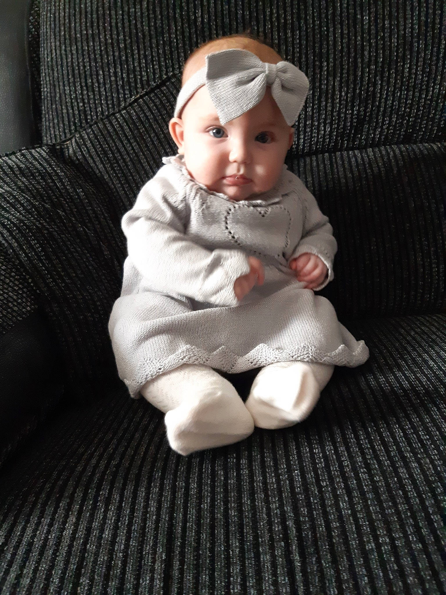 Sienna is registered to the contest to win money with this photo: baby, cheek, child, doll, figurine, head, joint, person, sitting, skin, toddler, toy