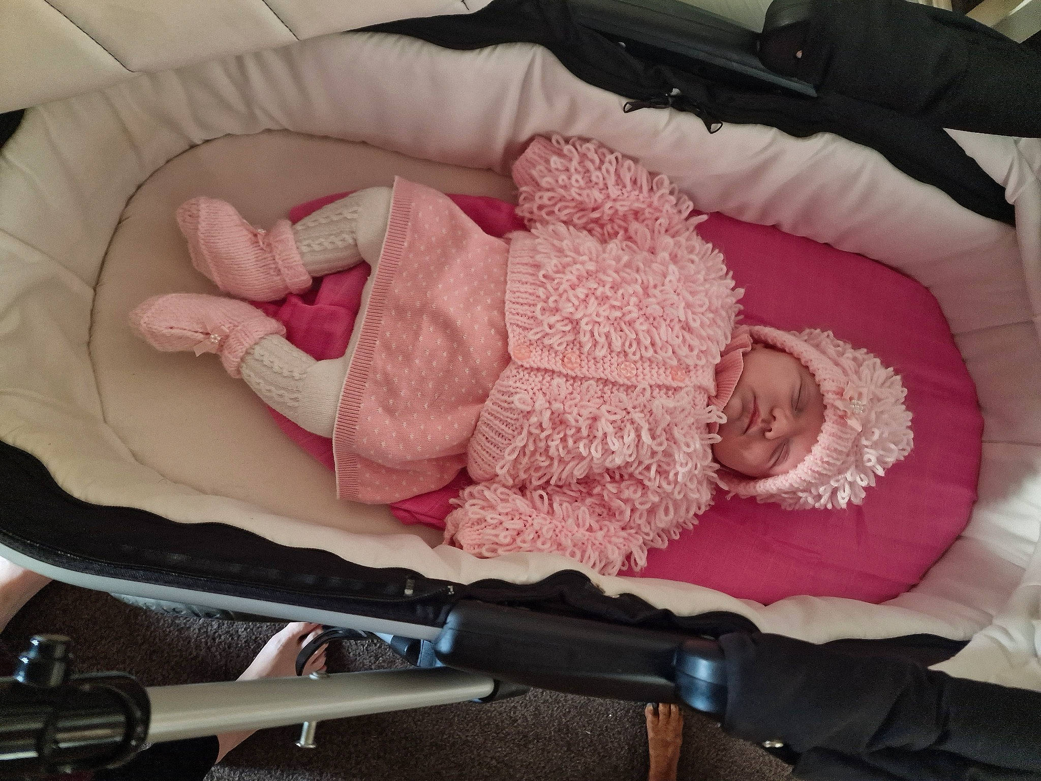 Sydney is registered to the contest to win money with this photo: baby, baby_products, baby_safety, baby_sleeping, baby_toddler_clothing, child, comfort, headwear, lap, linens, magenta, microphone, pattern, person, pink, product, room, textile, toddler