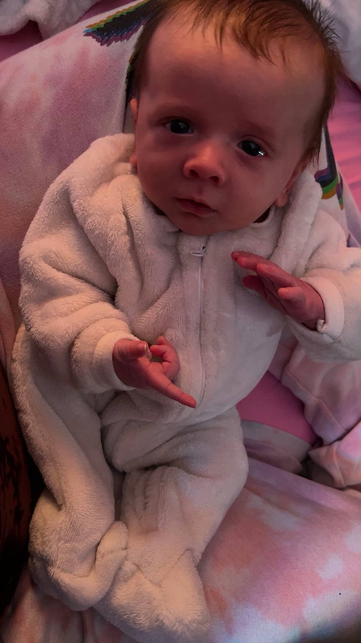 Lucas is registered to the contest to win money with this photo: baby, baby_toddler_clothing, cheek, comfort, dress, eye, face, finger, gesture, hair, head, human_body, lip, nail, nose, person, pink, skin, sleeve, thumb