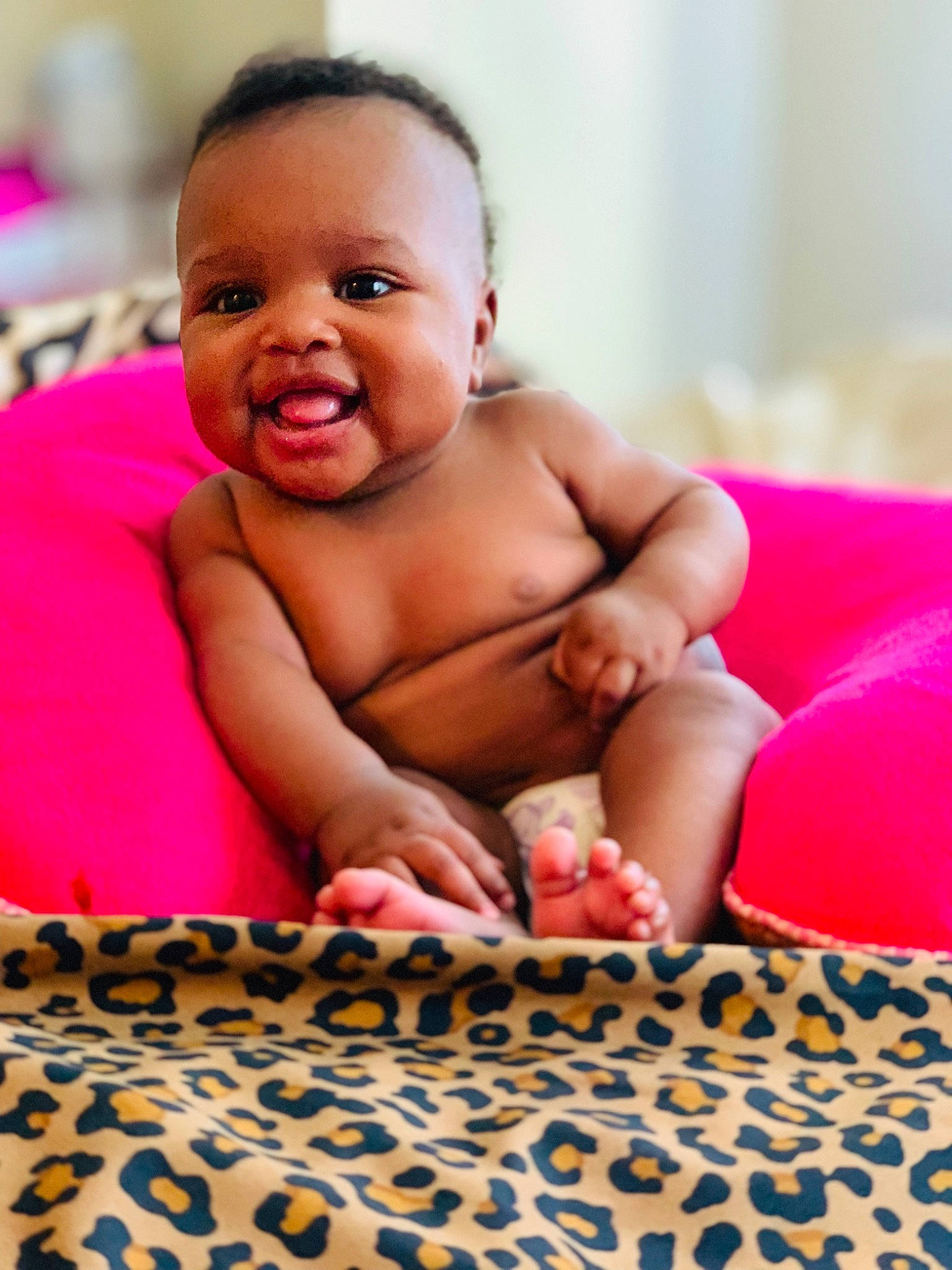 Juelz joined the competition — help win amazing prizes! baby, beauty, cheek, child, eye, face, finger, head, joy, lip, mouth, person, pink, sitting, skin, smile, toddler, tummy_time
