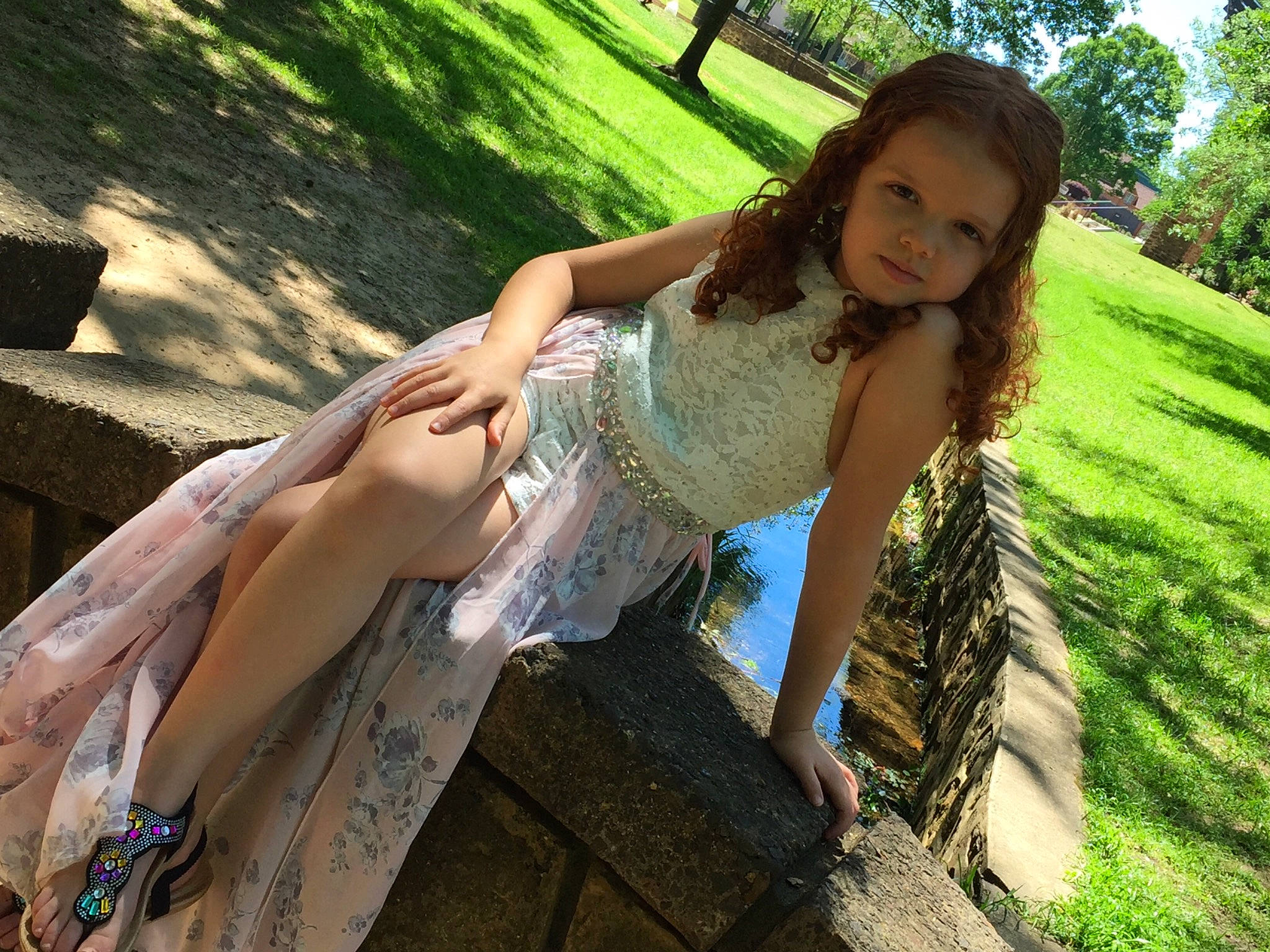 Nevaeh is registered to the contest to win money with this photo: beauty, brown_hair, dress, fashion, fawn, grass, green, lady, long_hair, model, people_in_nature, person, photo_shoot, photography, plant, sitting, smile, sunlight, tree