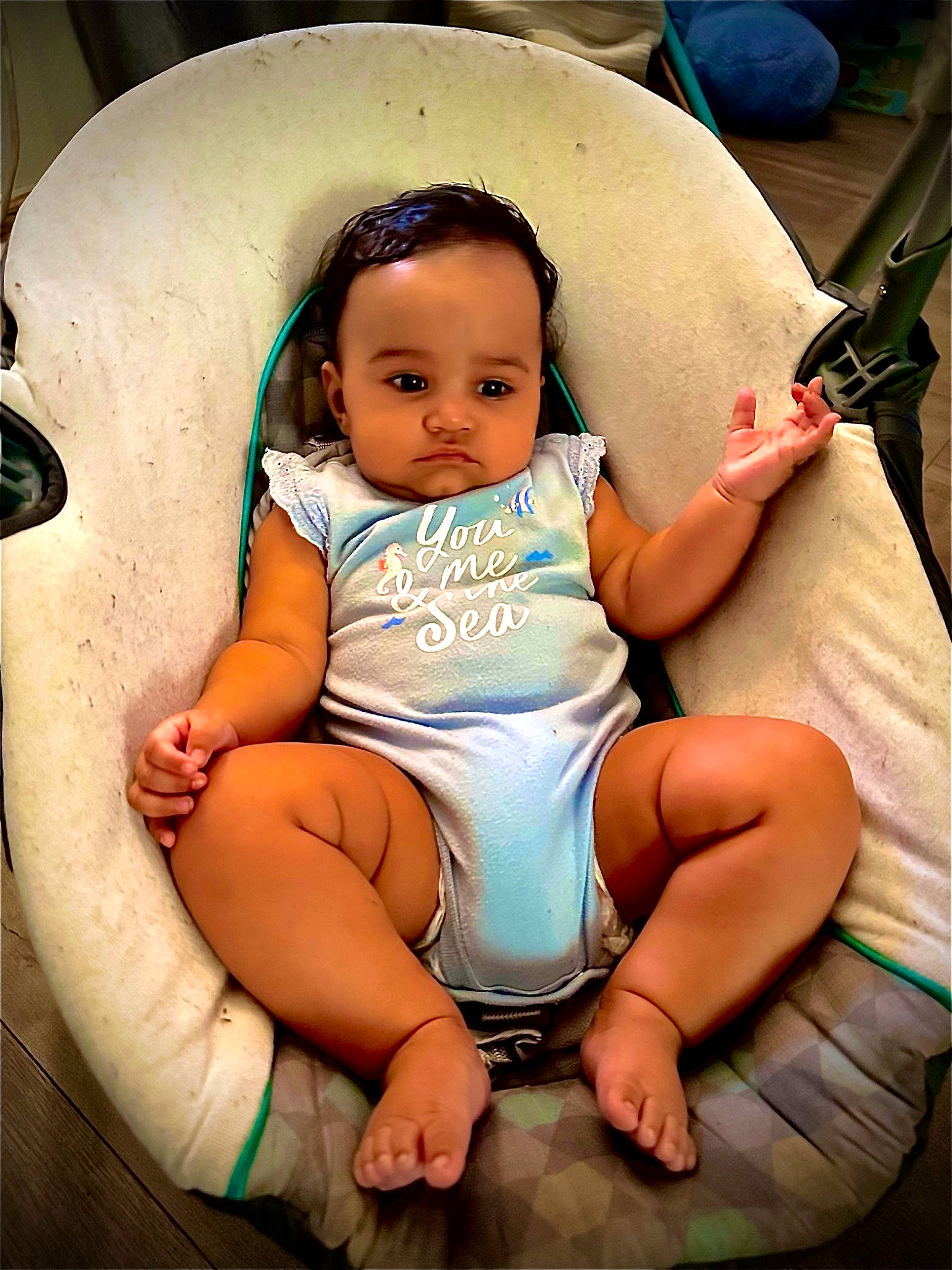 Tru is registered to the contest to win money with this photo: baby, baby_toddler_clothing, chair, cheek, chest, comfort, facial_expression, finger, flash_photography, foot, fun, happy, head, human_leg, lap, mouth, person, skin, thigh, toddler