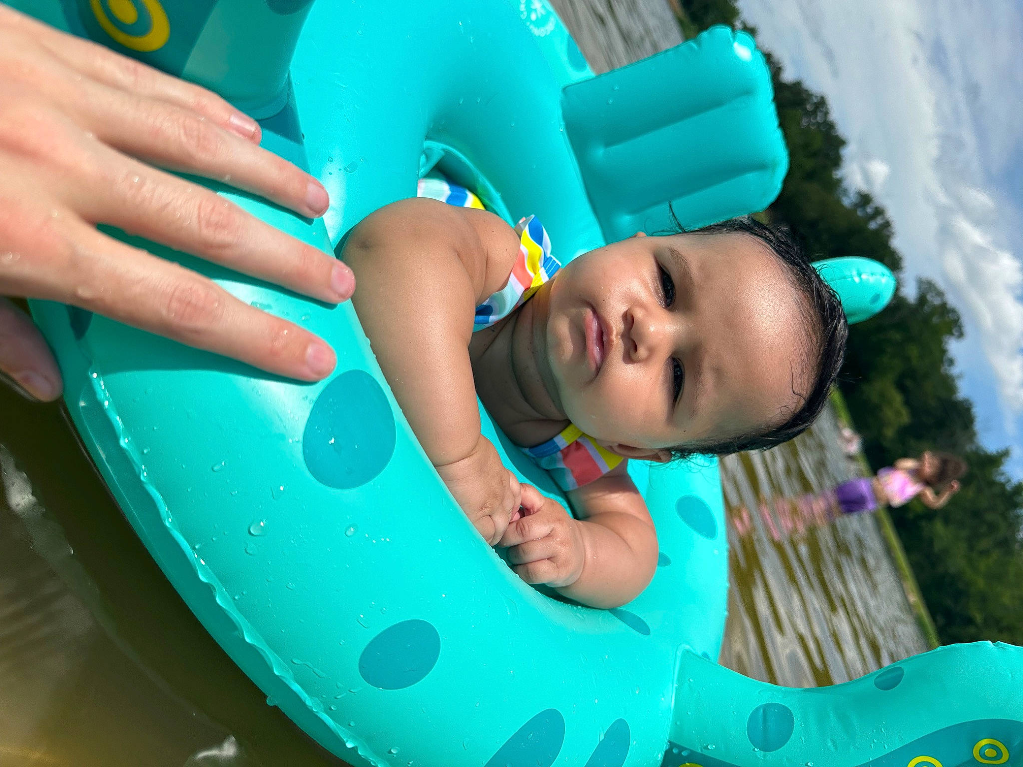 Tru is registered to the contest to win money with this photo: aqua, azure, baby, baby_toddler_clothing, beauty, blue, child, cloud, fun, grass, green, hand, happy, leisure, light, person, photograph, pink, product, summer