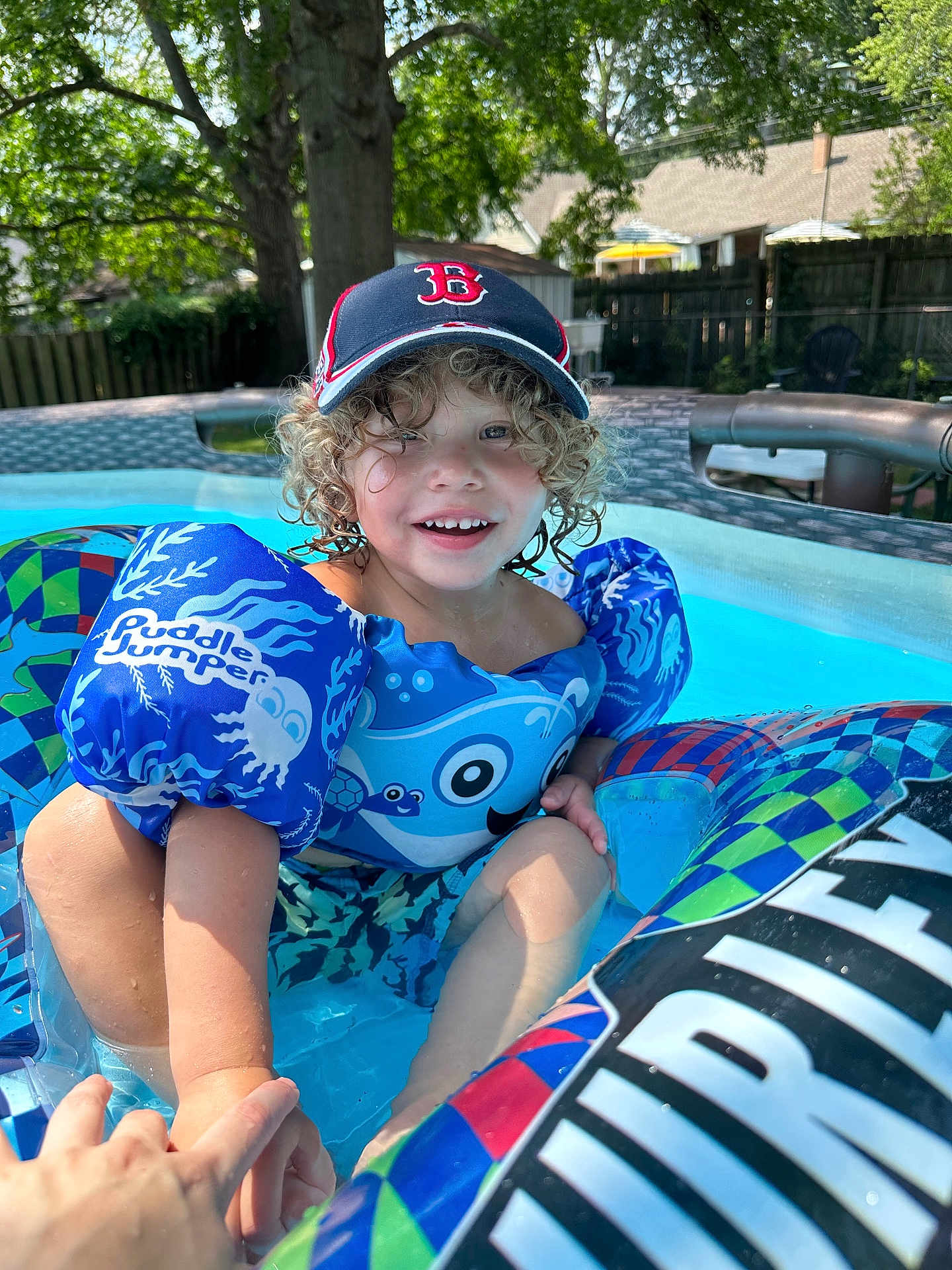 Liam joined the competition — help win amazing prizes! baseballcap, cap, clothing, face, hat, head, leisureactivities, person, photography, plant, pool, portrait, sport, summer, swimming, swimmingpool, swimwear, tree, water, watersports