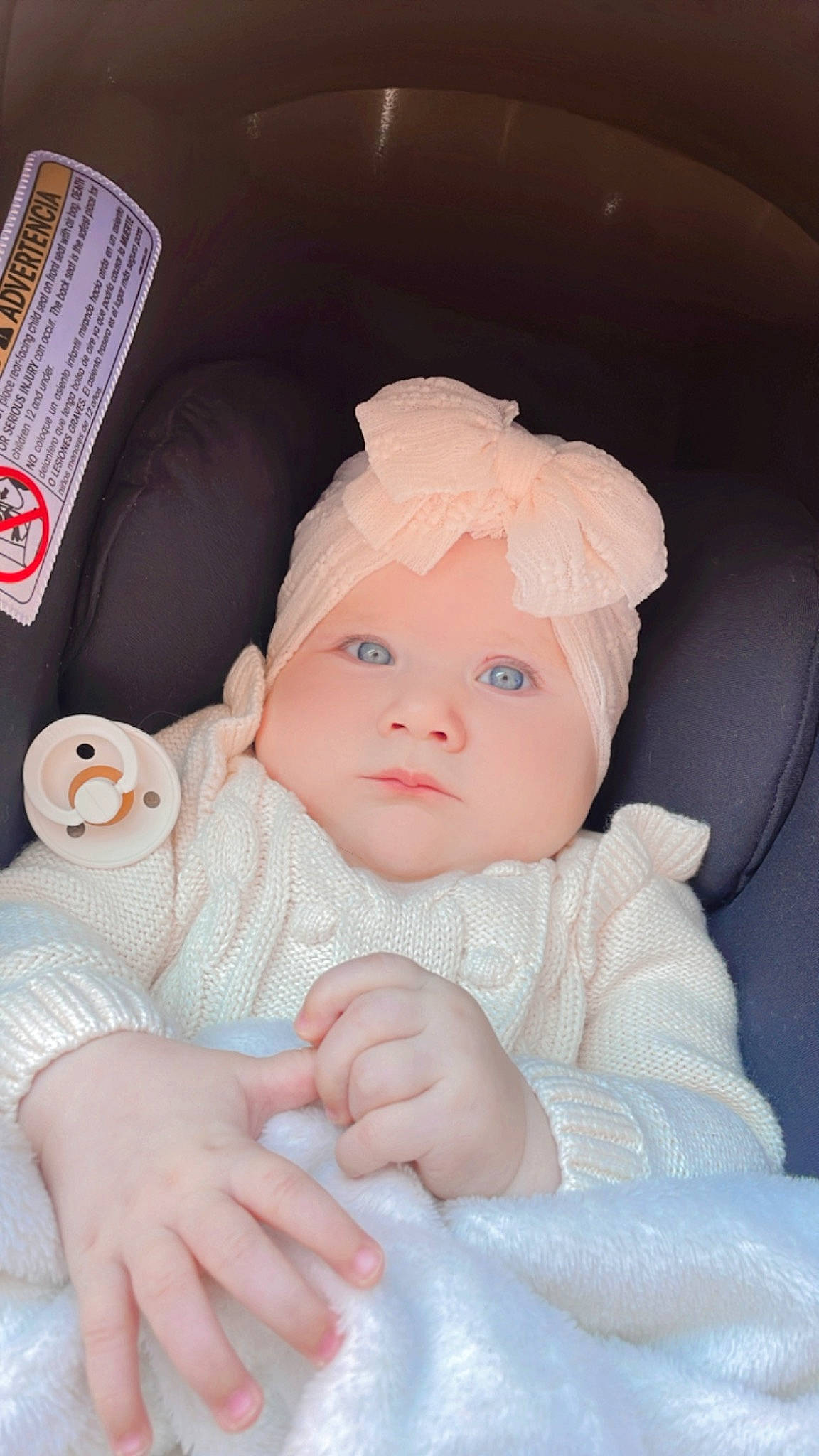 Adelina joined the competition — help win amazing prizes! baby, baby_products, baby_sleeping, baby_toddler_clothing, cap, cheek, child, comfort, dress, hat, head, headwear, linens, lip, person, portrait_photography, room, sitting, skin, sleeve