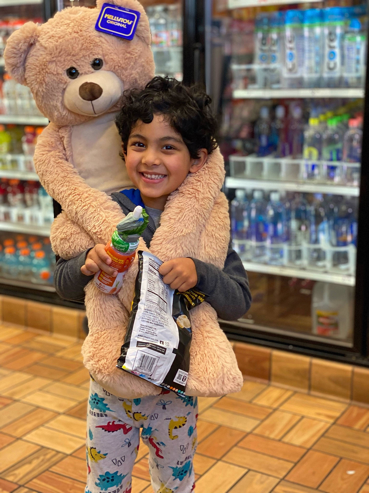 Julian joined the competition — help win amazing prizes! child, convenience_store, customer, fun, fur, happy, human, joy, leisure, person, photograph, plastic_bottle, retail, shelf, sleeve, smile, snapshot, teddy_bear, toddler, toy