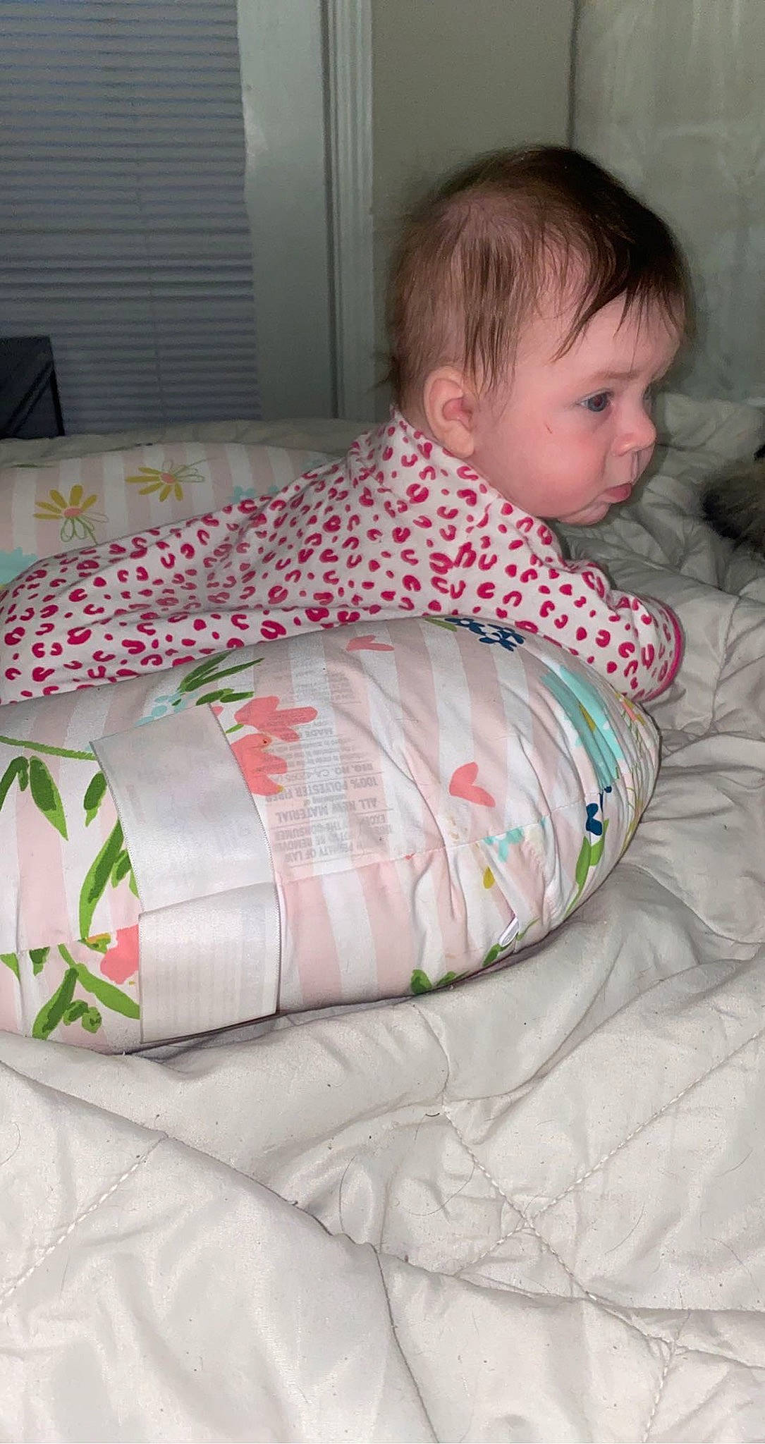 Malia is registered to the contest to win money with this photo: baby, baby_toddler_clothing, bed, bed_sheet, bedding, bedroom, bedtime, child, comfort, linens, pattern, person, pillow, product, rectangle, room, sitting, sleeve, t_shirt, textile