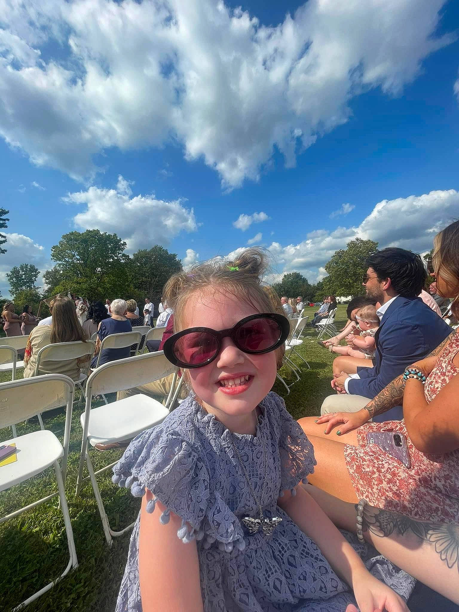 Ella Bee joined the competition — help win amazing prizes! blue, cloud, cool, crowd, daytime, eyewear, fun, glasses, goggles, grass, happy, joy, leisure, person, recreation, sky, smile, summer, sunglasses, travel