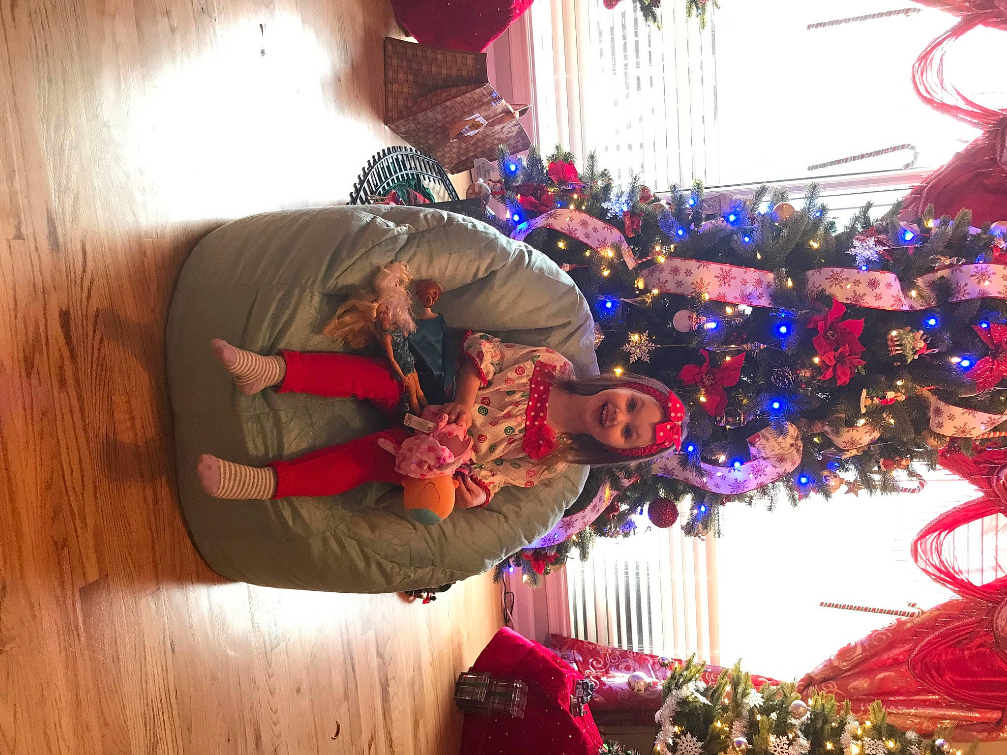 Ella Bee is registered to the contest to win money with this photo: christmas, christmas_decoration, christmas_eve, christmas_ornament, christmas_tree, electric_blue, event, fun, hardwood, headwear, holiday, holiday_ornament, joy, leisure, magenta, ornament, person, plant, purple, room