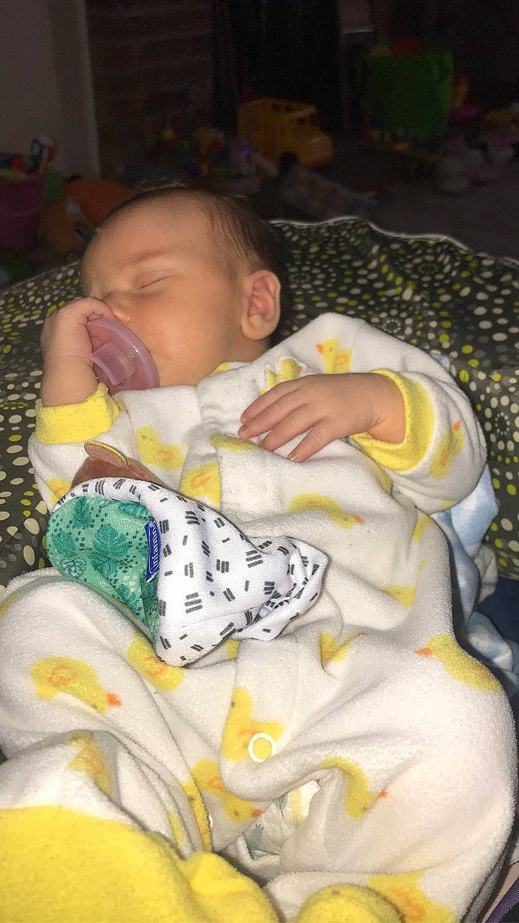 River joined the competition — help win amazing prizes! baby, baby_products, baby_toddler_clothing, bedtime, cheek, child, comfort, finger, head, linens, nap, pattern, person, room, sitting, skin, sleep, textile, thumb, toddler