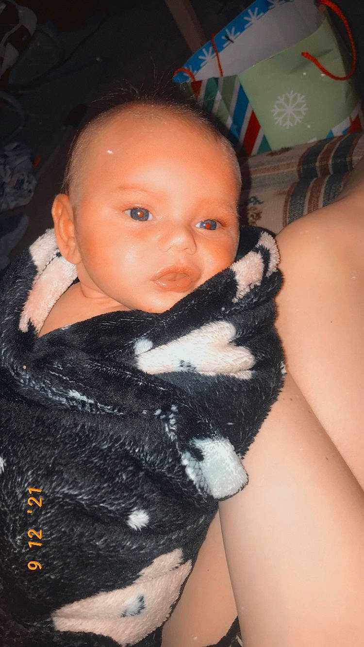 River joined the competition — help win amazing prizes! abdomen, beard, black_hair, chest, comfort, dress, eyelash, fur, glove, human_body, human_leg, lip, nail, neck, person, sitting, skin, thigh, thumb, toddler