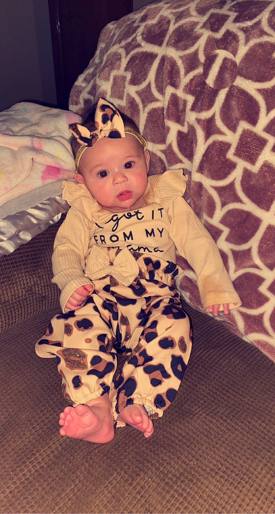 Alanna joined the competition — help win amazing prizes! baby, baby_products, baby_sleeping, baby_toddler_clothing, cheek, child, comfort, eye, flooring, foot, fur, happy, headwear, linens, pattern, person, pink, sitting, skin, sleeve