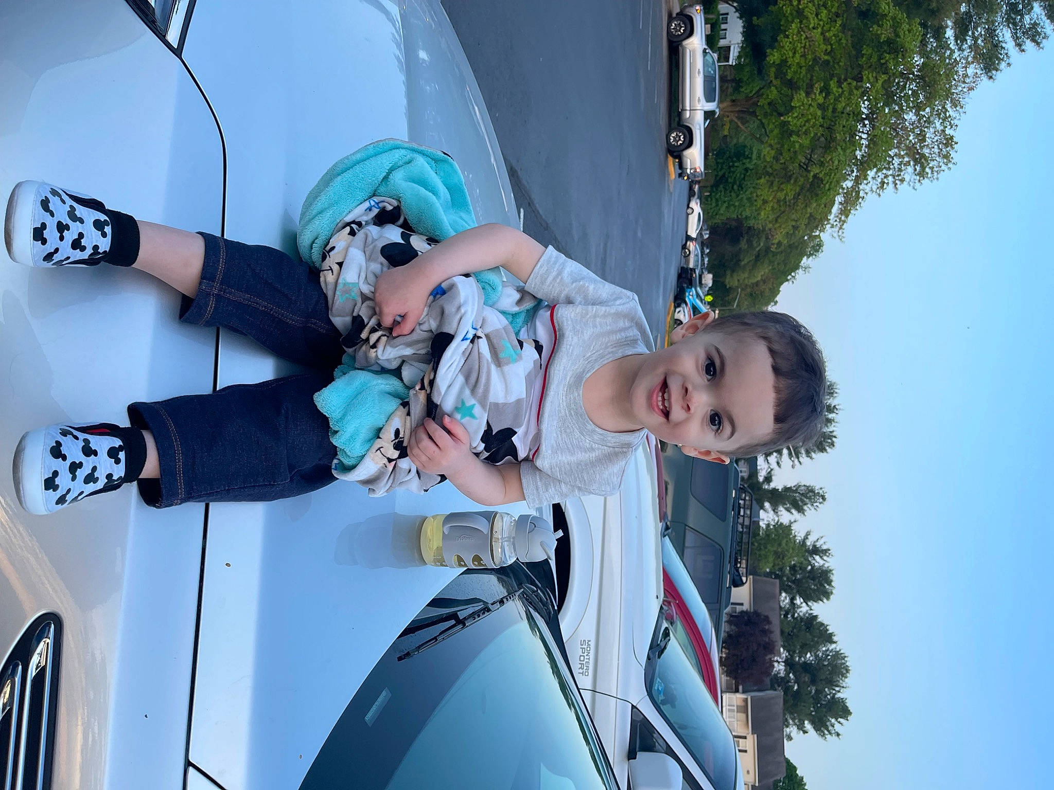 Matteo is registered to the contest to win money with this photo: automotive_design, automotive_exterior, automotive_lighting, automotive_tire, automotive_wheel_system, bumper, car, electric_blue, family_car, fun, hood, joy, leisure, motor_vehicle, person, recreation, sky, t_shirt, tree, vehicle