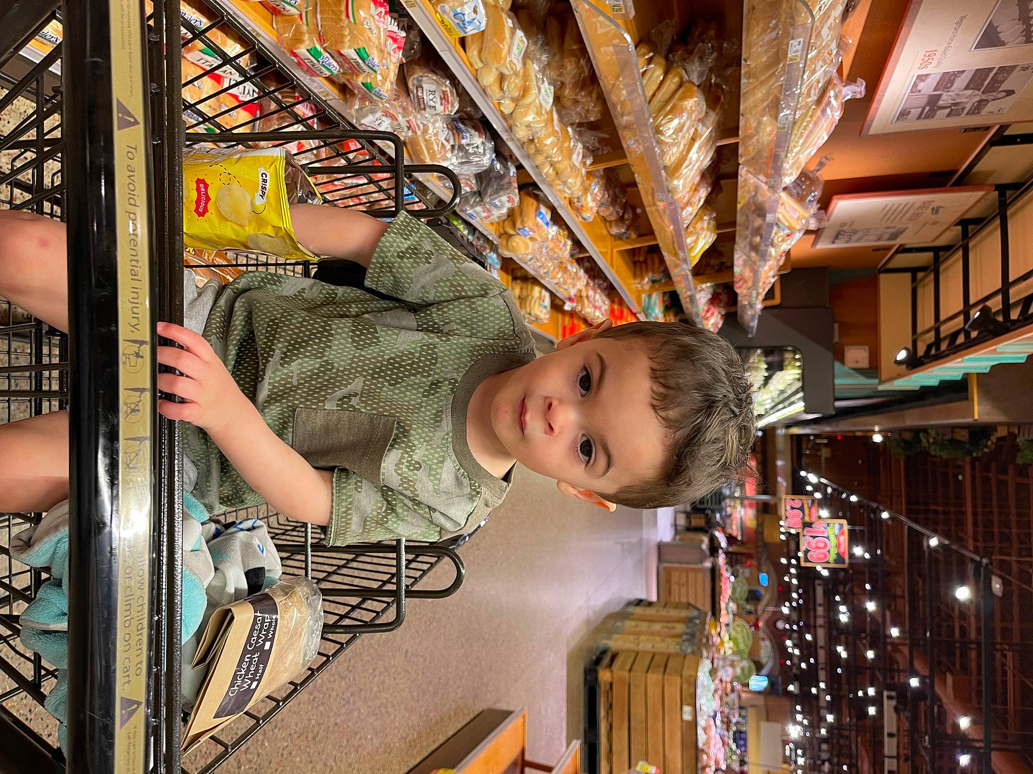 Matteo is registered to the contest to win money with this photo: baby, baby_toddler_clothing, building, ceiling, child, city, fun, happy, leisure, metal, pattern, person, retail, symmetry, toddler, wood