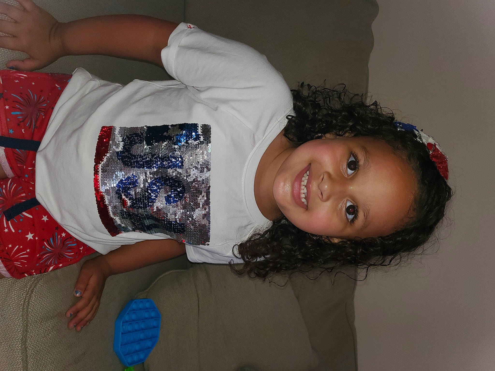 Leah is registered to the contest to win money with this photo: abdomen, arm, child, elbow, electric_blue, event, eye, fun, gesture, happy, human_body, human_leg, joint, joy, neck, organ, person, sleeve, smile, thigh