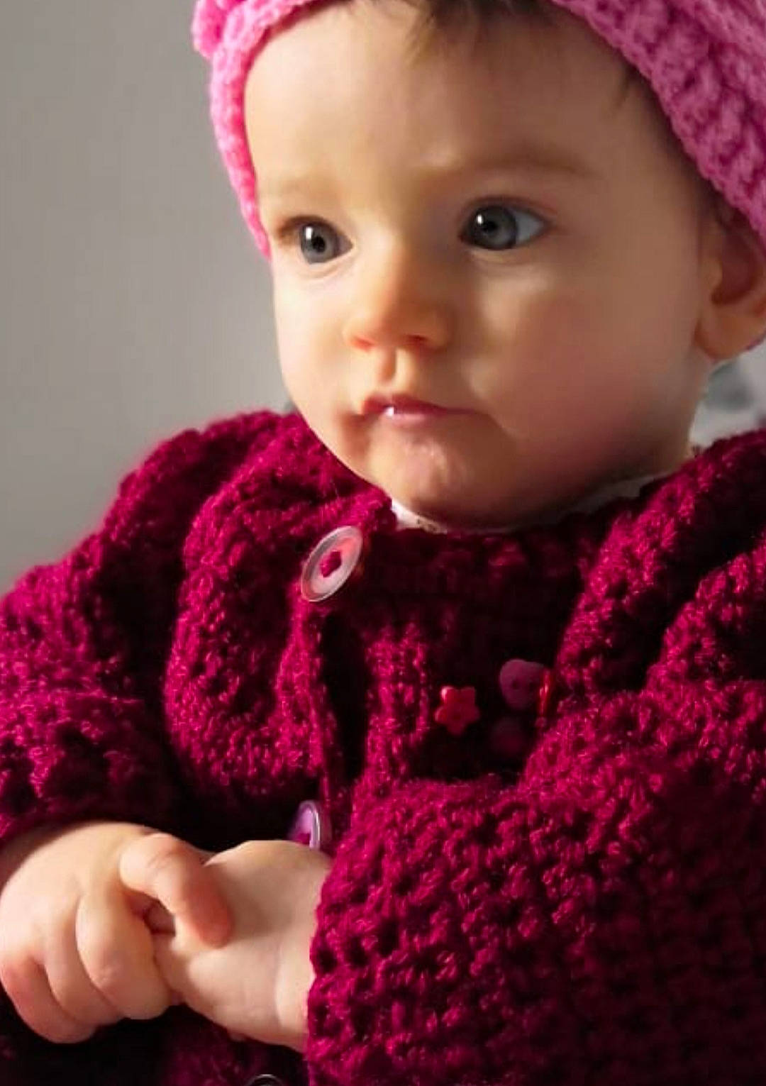 Eryn participe au concours pour gagner de l'argent avec cette photo : baby_toddler_clothing, cap, cheek, chin, creative_arts, dress, eye, eyebrow, face, head, iris, lip, neck, organ, outerwear, person, photograph, pink, skin, sleeve