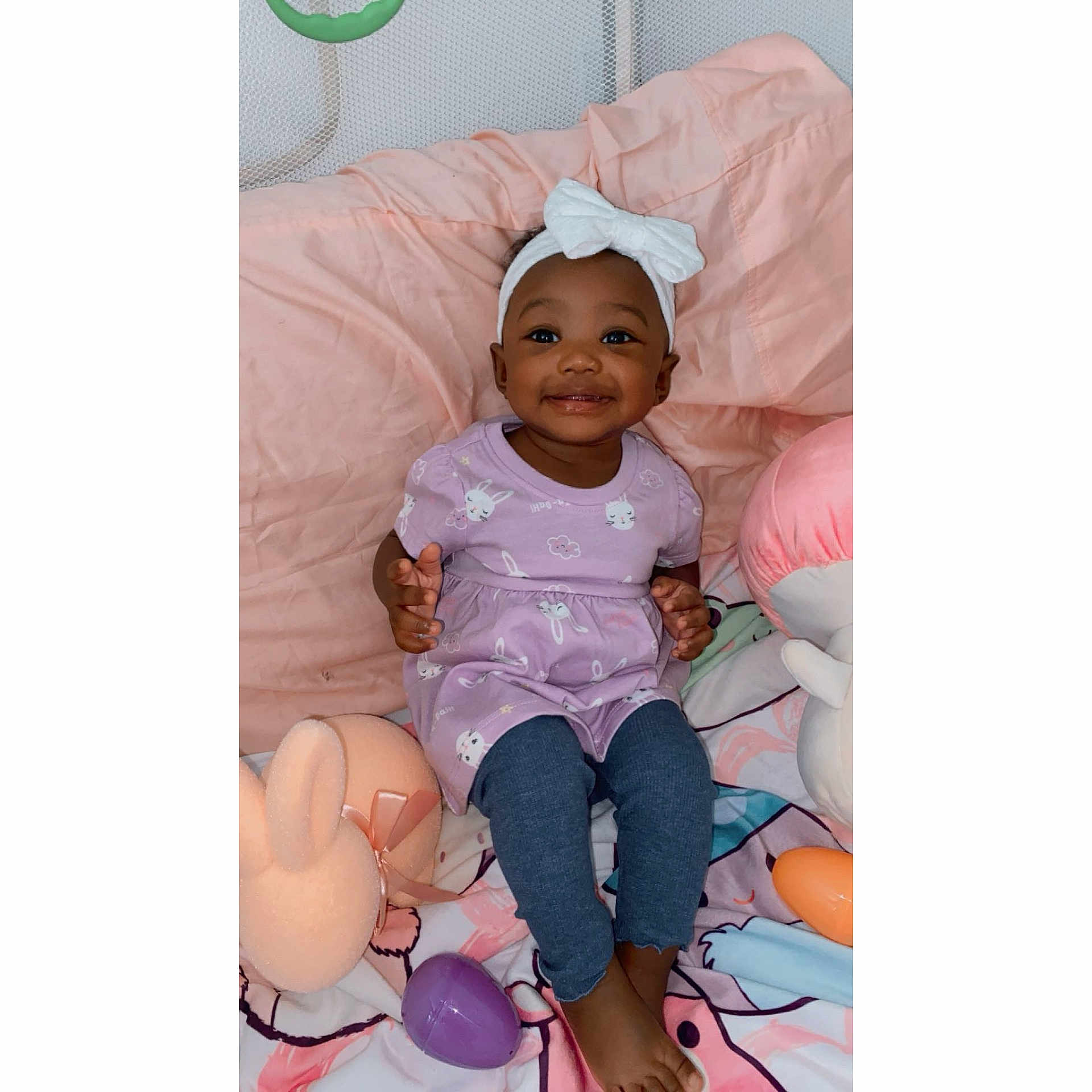 Samayla is registered to the contest to win money with this photo: baby, clothing, couch, crib, cushion, face, footwear, furniture, happy, hat, head, homedecor, infantbed, pants, person, photography, portrait, shoe, sitting, smile