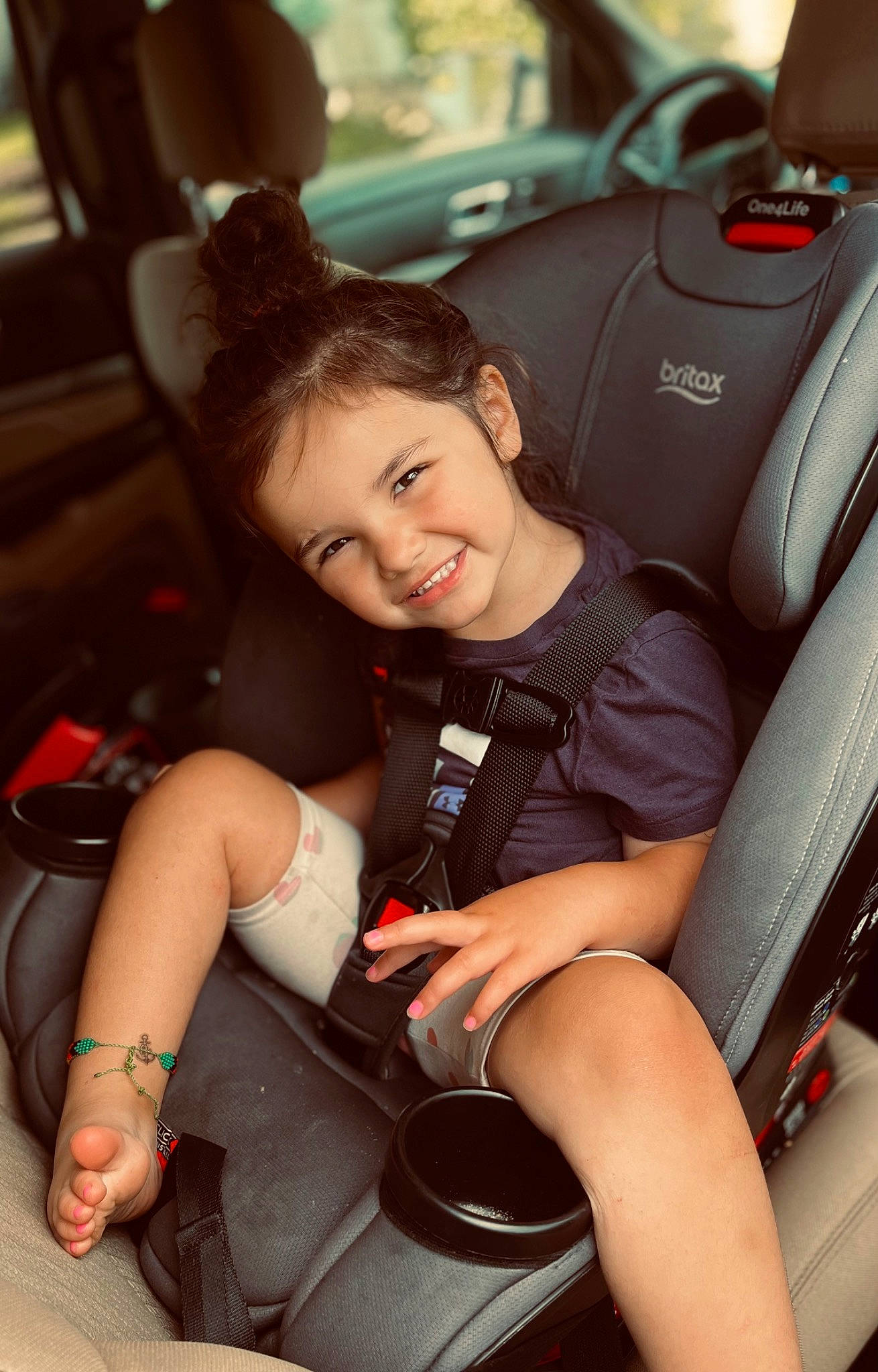 Laikynn is registered to the contest to win money with this photo: auto_part, automotive_design, automotive_exterior, automotive_tire, car, car_seat, car_seat_cover, comfort, flash_photography, joy, leg, motor_vehicle, person, personal_luxury_car, shoe, shorts, smile, steering_part, steering_wheel, thigh