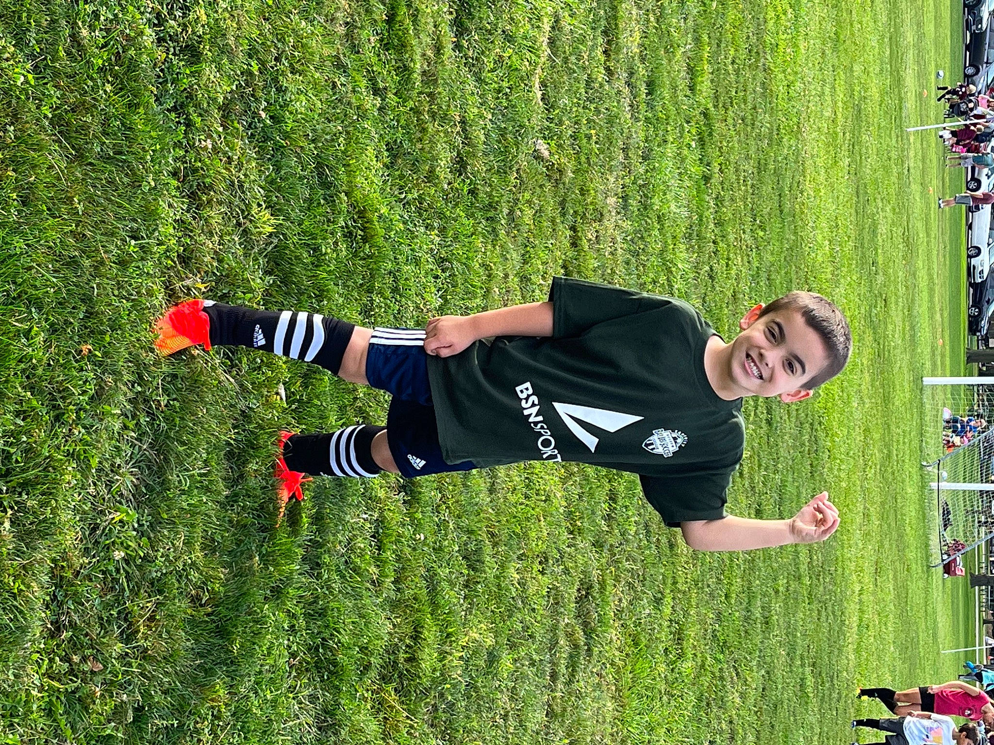 Carsyn joined the competition — help win amazing prizes! competition_event, football_player, fun, grass, grass_family, grassland, joy, lawn, leisure, people_in_nature, person, plant, player, recreation, shorts, soccer, soccer_ball, soccer_player, sports, sportswear