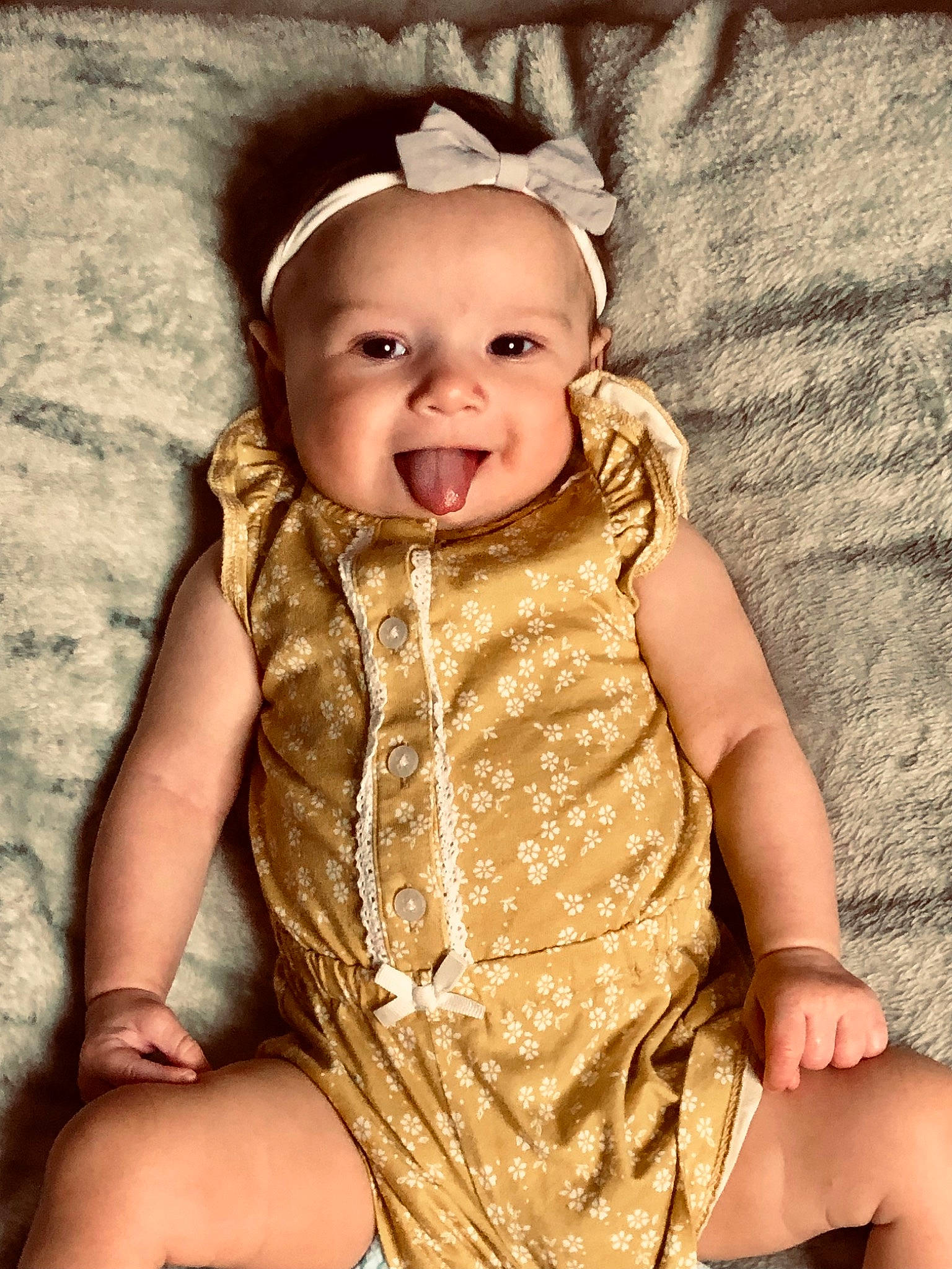 Charlotte is registered to the contest to win money with this photo: baby, baby_toddler_clothing, beauty, cheek, dress, eye, finger, flash_photography, happy, head, headwear, human_body, iris, lip, outerwear, pattern, person, pink, skin, sleeve