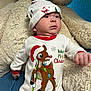 Zhaiden Emiliano joined the competition — help win amazing prizes! baby, christmas, holiday, festive, reindeer, lights, hat, teddy_bear, plush, cute, infant, clothing, red, white, smiling, indoors, child, portrait, soft, cozy