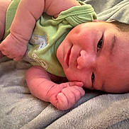 Zhaiden Emiliano is registered to the contest to win money with this photo: baby, infant, smiling, face, arm, blanket, onesie, soft, cute, skin, newborn, child, sleeping, cozy, portrait, closeup, person, lying, happy, indoors