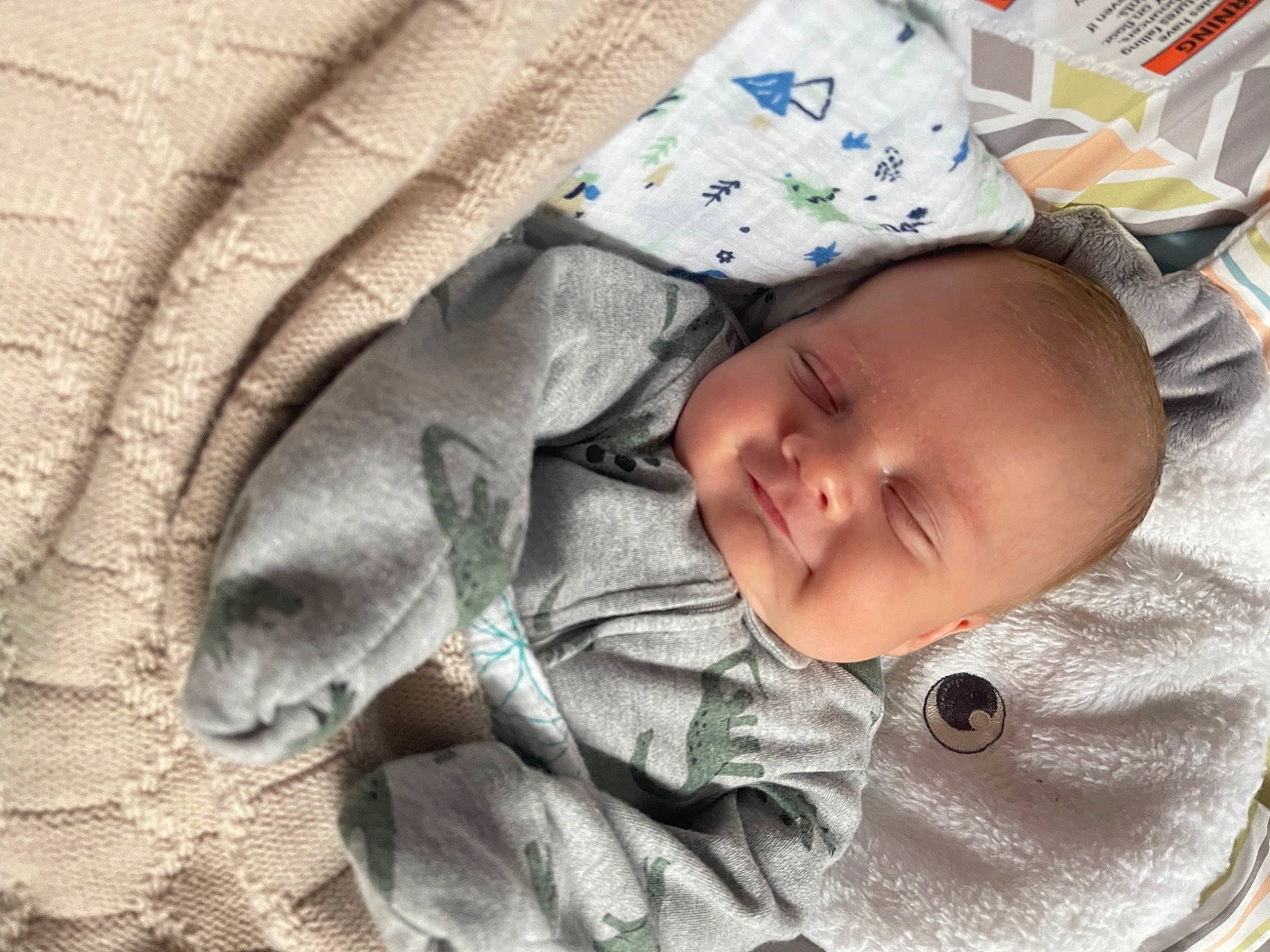 Paxton joined the competition — help win amazing prizes! baby, baby_products, baby_safety, baby_toddler_clothing, cheek, child, comfort, eye, face, fur, head, linens, mammal, pattern, person, skin, sleeve, smile, textile, toddler