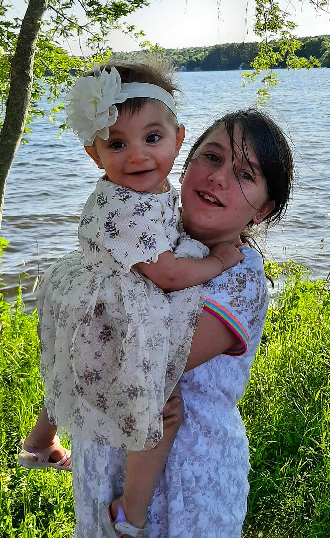 Kyaleah joined the competition — help win amazing prizes! baby_toddler_clothing, botany, eye, gesture, grass, hairstyle, happy, headwear, interaction, iris, joy, lake, leaf, organ, people_in_nature, person, photograph, pink, plant, skin