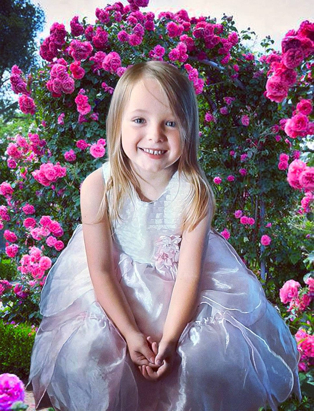 Eva joined the competition — help win amazing prizes! annual_plant, botany, dress, eye, flash_photography, flower, flowering_plant, grass, happy, head, iris, joy, magenta, people_in_nature, person, petal, pink, plant, smile, toddler