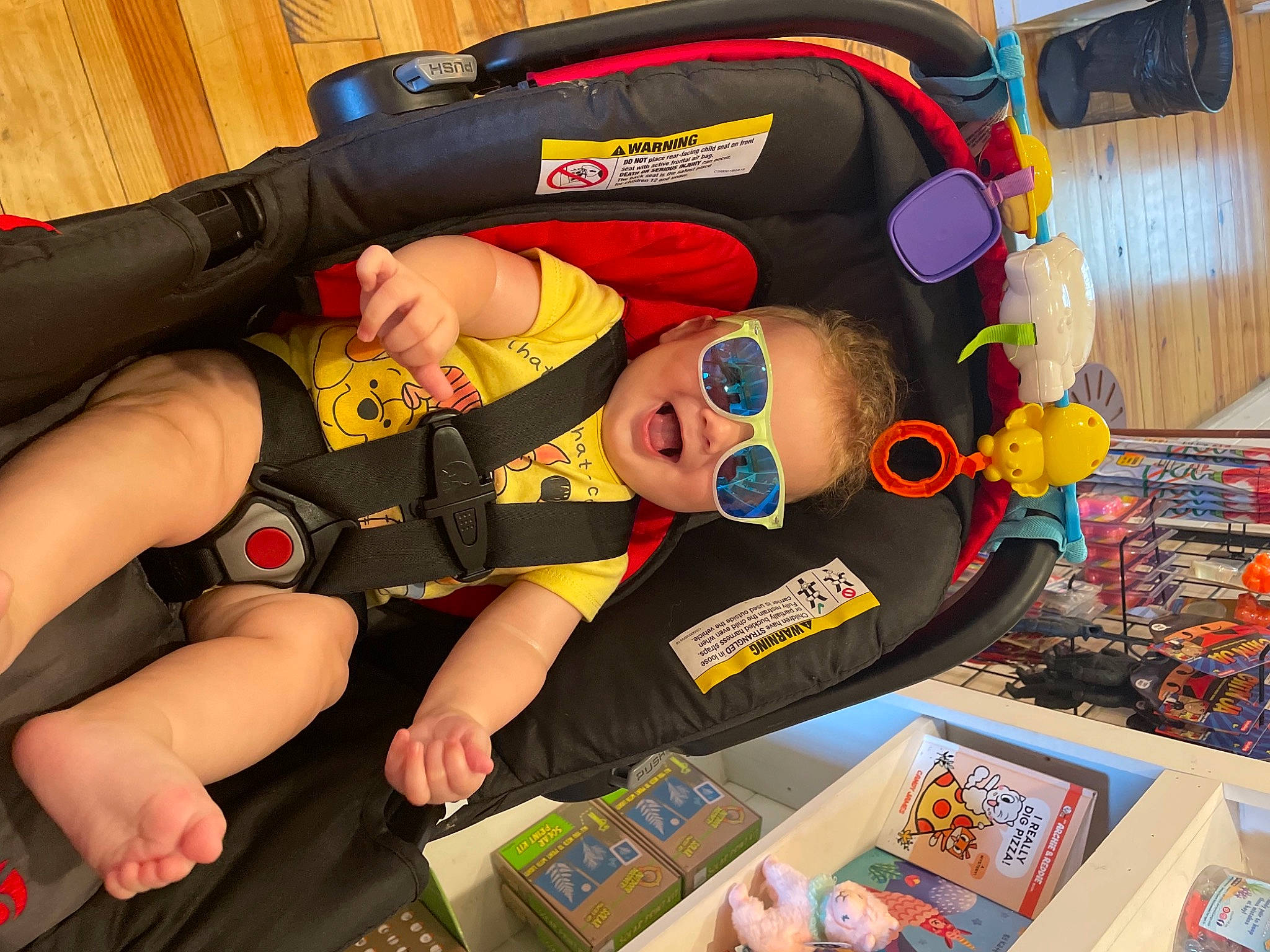 Leland joined the competition — help win amazing prizes! baby_products, bag, comfort, fictional_character, fun, human_leg, knee, person, personal_protective_equipment, publication, recreation, shorts, thigh, toddler, toy, wrist