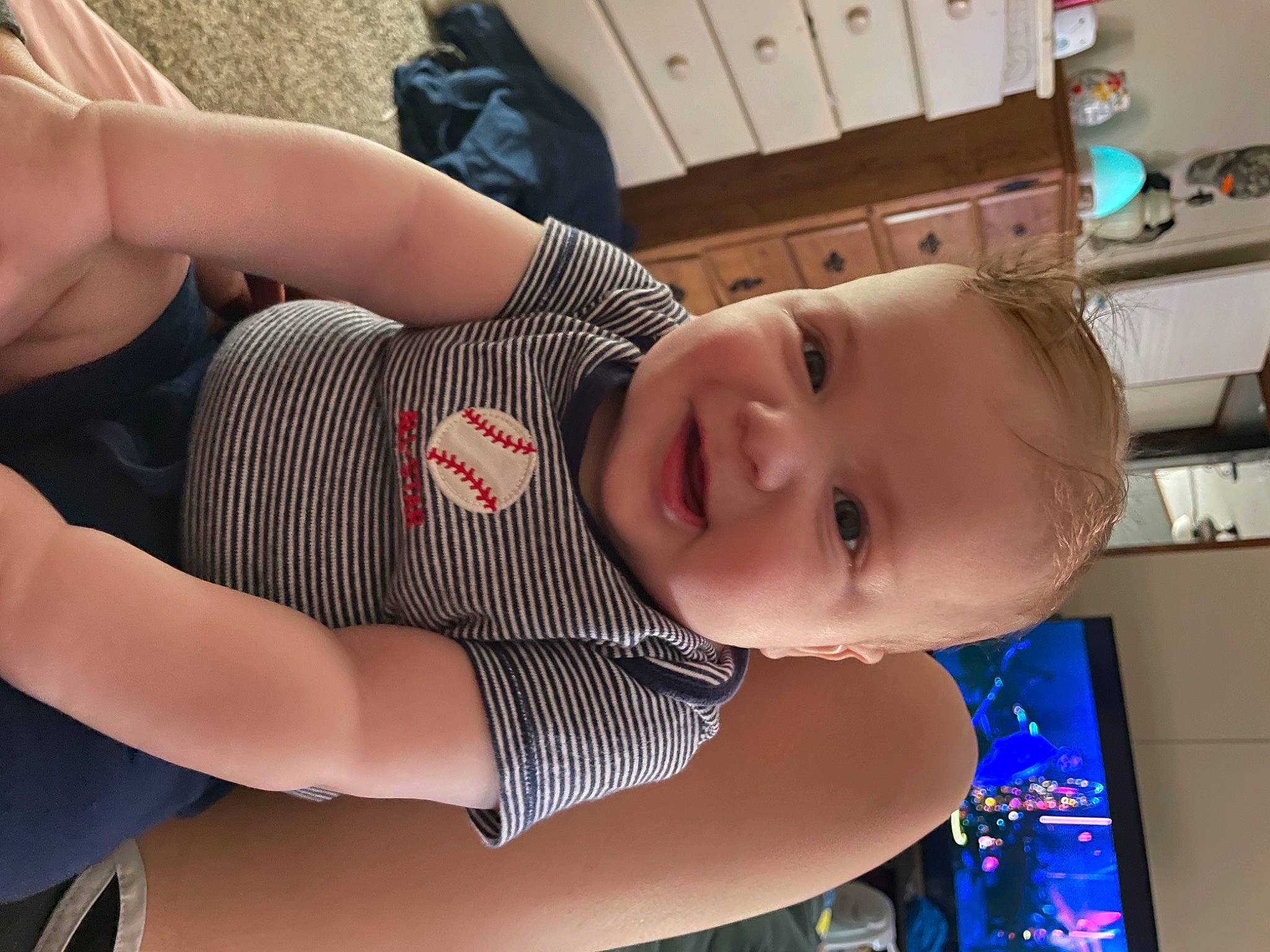 Leland joined the competition — help win amazing prizes! abdomen, arm, baby, chest, dress, elbow, facial_expression, finger, hairstyle, happy, joint, knee, mouth, muscle, neck, person, skin, smile, thigh, toddler