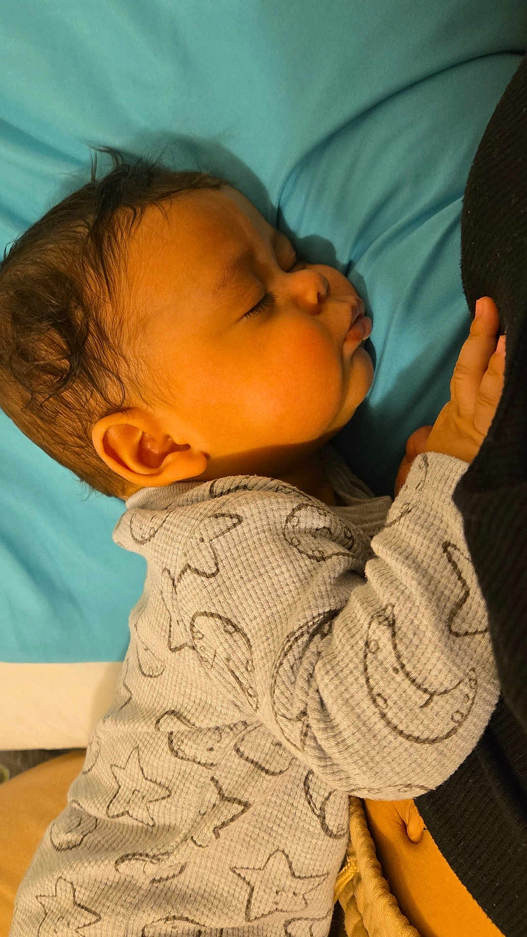 Kayden joined the competition — help win amazing prizes! baby, sleeping, pajamas, moon, star, blanket, face, hand, cozy, child, infant, closeup, rest, soft, cute, peaceful, warm_light, portrait, indoor, skin