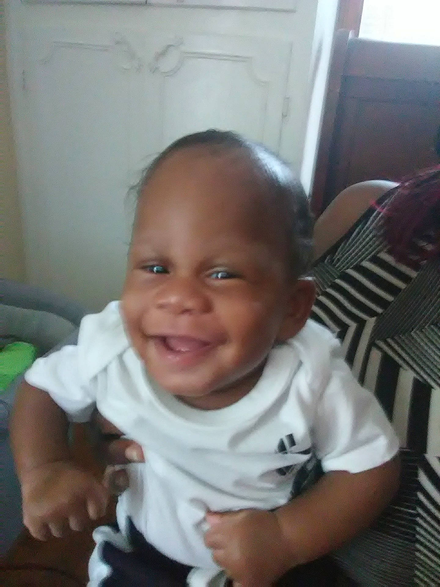 Ethan is registered to the contest to win money with this photo: cheek, child, day, ear, eye, eyebrow, face, forehead, girl, hair, head, infant, nose, person, product, skin, smile, toddler