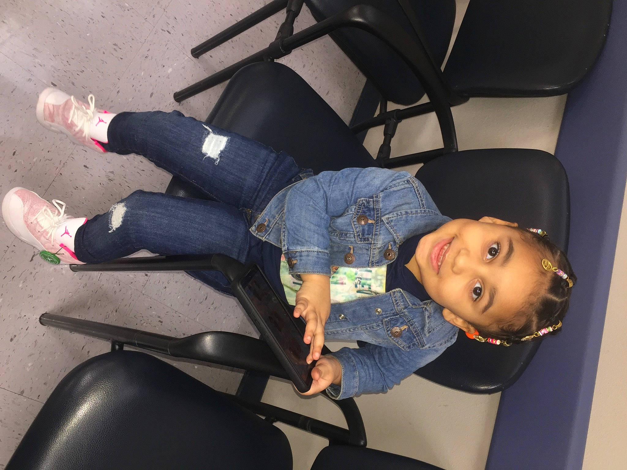 Ariah is registered to the contest to win money with this photo: auto_part, automotive_design, chair, comfort, electric_blue, foot, fun, human_leg, joint, joy, knee, lap, leg, luxury_vehicle, person, shoe, sitting, smile, sneakers, sock