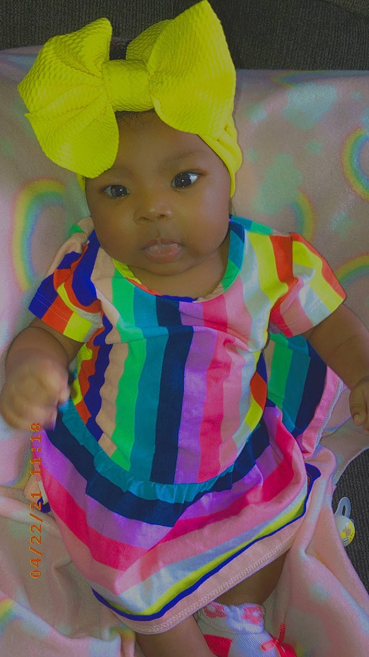 Brooklynn joined the competition — help win amazing prizes! baby, baby_products, baby_toddler_clothing, cap, cheek, child, dress, face, fun, happy, head, headgear, headwear, human_body, magenta, pattern, person, pink, sleeve, t_shirt